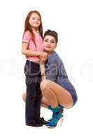 Happy young mother and little daughter. Isolated