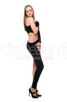 Sensual young woman in skintight black costume