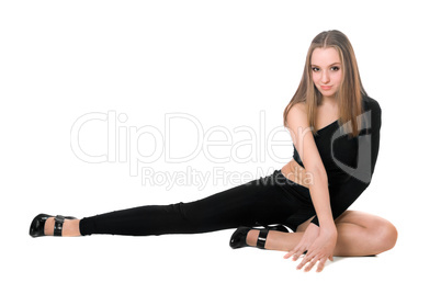Playful leggy girl in a black tight-fitting body suit dance