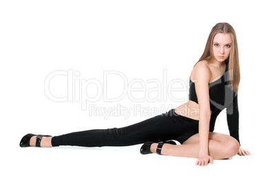 Sexy young woman in a black tight-fitting body suit dance
