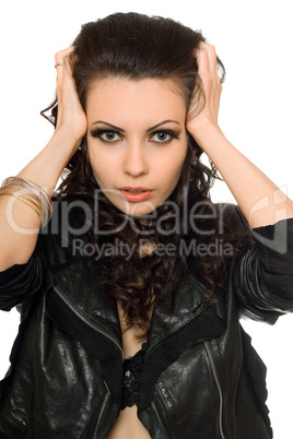 Closeup portrait of beautiful brunette in black clothes