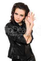 Portrait of pretty young brunette in black clothes