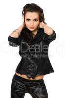 Portrait of gorgeous young brunette in black clothes. Isolated