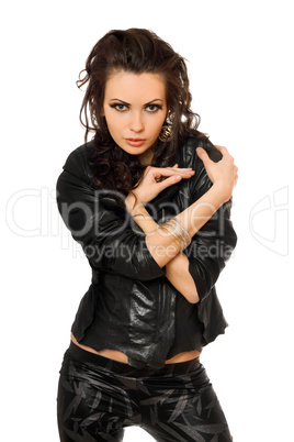 Portrait of sexy young brunette in black clothes. Isolated