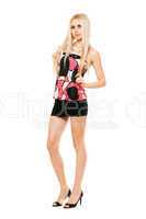 Pretty leggy young blonde in black miniskirt