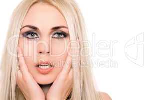 Closeup portrait of sensual young blonde. Isolated