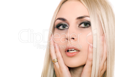 Closeup portrait of attractive young blonde. Isolated
