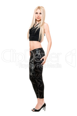 Attractive young blonde in black leggings