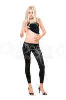 Seductive young blonde in black leggings
