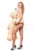 young woman posing with large teddy bear