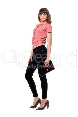 Young woman in a black leggings. Isolated
