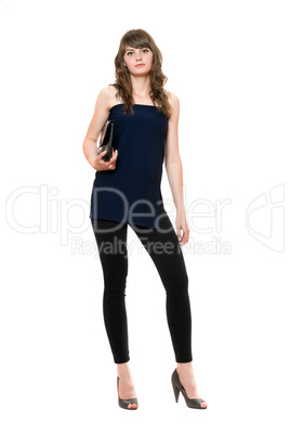 Young beautiful woman in a black leggings. Isolated