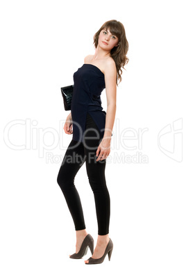 Pretty girl in a black leggings. Isolated