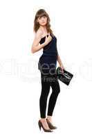 Nice girl in black leggings with a handbag