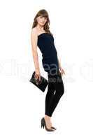 Lovely girl in black leggings with a handbag