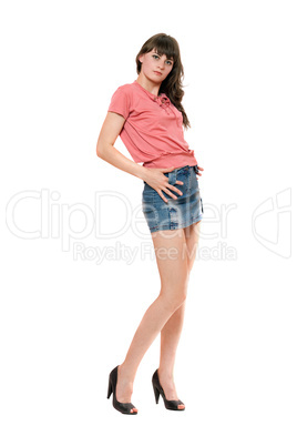 Cute girl in jeans mini skirt. Isolated