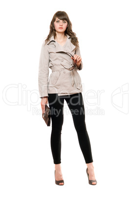 Beautiful girl wearing a coat and black leggings