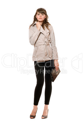 Charming girl wearing a coat and black leggings