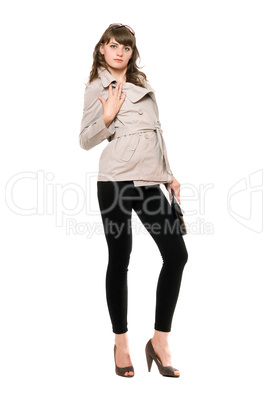 Pretty girl wearing a coat and black leggings
