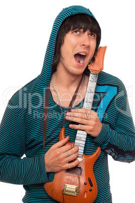 Crazy young man with a little guitar