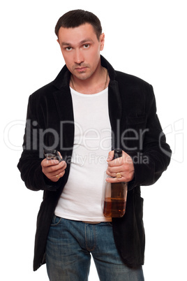 Man with a phone and bottle of scotch