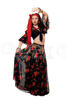Dancing gypsy woman in a black skirt. Isolated