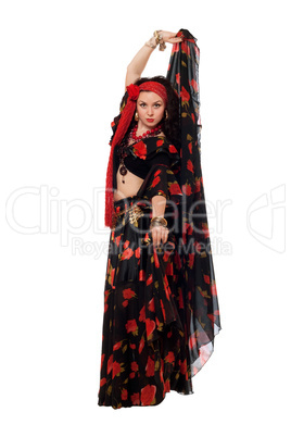 Expressive gypsy woman in a black skirt