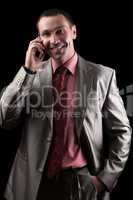 Portrait of a happy businessman. Isolated