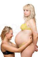 young woman and a pregnant girlfriend