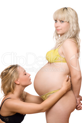 Pregnant woman with the girlfriend. Isolated