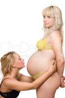 Pregnant woman with the girlfriend. Isolated