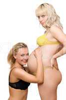 Pregnant woman with the girlfriend. Isolated