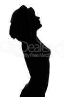 Silhouette of a naked sexy young woman