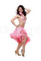 Cheerful brunette in pink dancing dress. Isolated