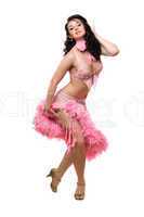 Lovely brunette in pink dancing dress. Isolated