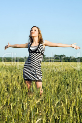 attractive young woman in the field