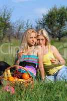Two sensual blonde with wineglasses