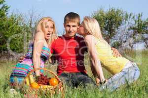 Two beautiful blonde and young man