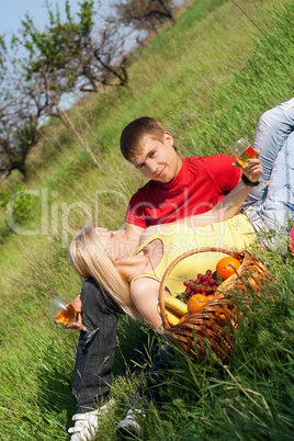 Pretty blonde and young man with wineglasses