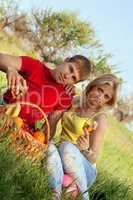 Attractive blonde and young man with wineglasses