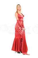 Elegant young blonde in red dress. Isolated
