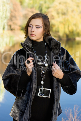 young woman in autumn park