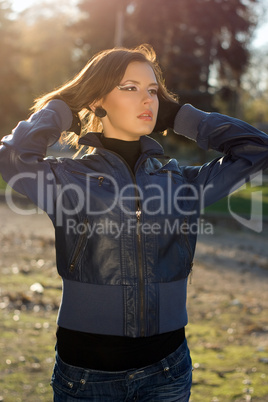 charming girl in autumn park