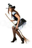 Attractive young woman with a besom
