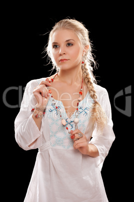 Portrait of a beautiful young blonde. Isolated