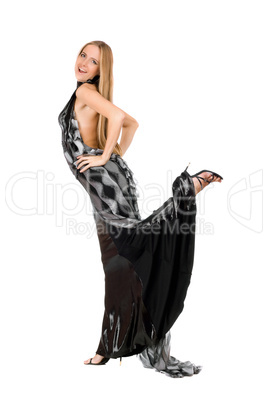 Playful young woman in evening dress