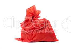 Red bag of Christmas gifts