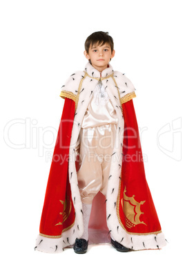 boy dressed in a robe of King
