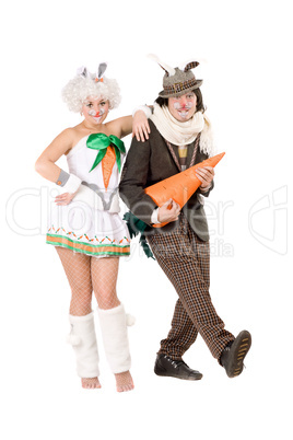 couple with carrot dressed as rabbits