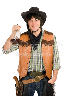 happy young cowboy with a bottle